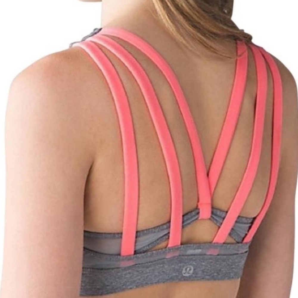 Lululemon grey and neon orange sports bra